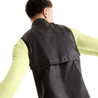 A man wearing the ON Layering Weather Vest (New Generation) in Black.