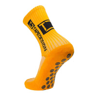 Tapedesign all round classic grip sock in orange.