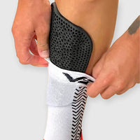 Smart Armor shin pads in black for football and other contact sports