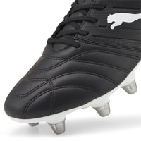 Avant PUMA rugby boots in black and white made from soft synthetic leather. Close up of front of one boot