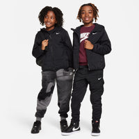 two kids wearing black Nike Therma-Fit Repel Outdoor Play Top Jackets