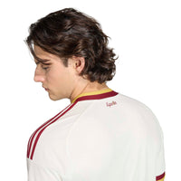 Man wearing Spain '26 Away Football Shirt from behind close up