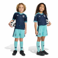 Kids modelling the Germany '26 Away Football Mini Kit