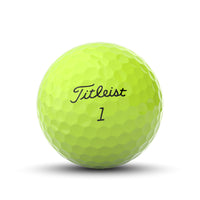 A yellow Titleist Pro V1 2023 golf ball.