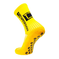 Tapedesign all round classic grip sock in yellow.