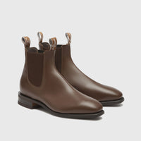 A pair of R.M. Williams comfort craftsman boots in dark tan brown.