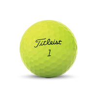 A Titleist Tour Speed 2022 golf ball in yellow.