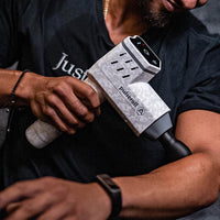 Anthony Joshua using the Pulseroll AJ Ignite pro massage gun.