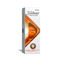 A 3 pack of Titleist Velocity 2022 golf balls in orange.