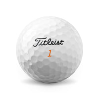 A Titleist velocity white golf ball.