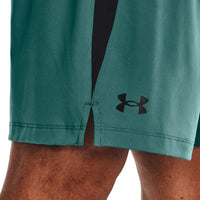 Under Armour tech vent shorts in coral green.