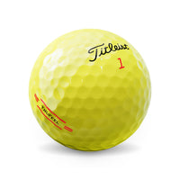 A Titleist Tru-Feel golf ball in yellow.