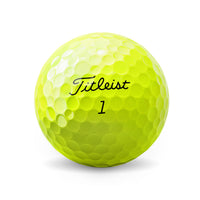 A Titleist AVX 2022 Golf ball in yellow.