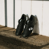 Canterbury Phoenix Raze SG rugby boots in black.