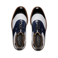 A top down view of a pair of FootJoy white/Navy golf shoes.